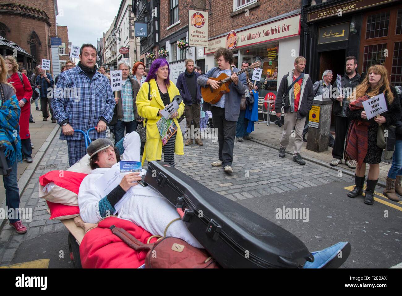 Chester, UK. 17th September, 2015. Left-wing comedian Mark Thomas (left) was in Chester today (Thursday) at a city centre ‘loiterers' event' aimed at protesting against a proposed measure criticised for criminalising rough sleepers. He is pictured with Johhny Walker who is the director of the Keep The Streets Alive campaign. Mark is trying to highlightin a plan to fine homeless people £100 if they lie down or sleep in any public space within a designated zone. This fine can also apply to buskers and people who feed birds. Credit:  Brian Hickey/Alamy Live News Stock Photo
