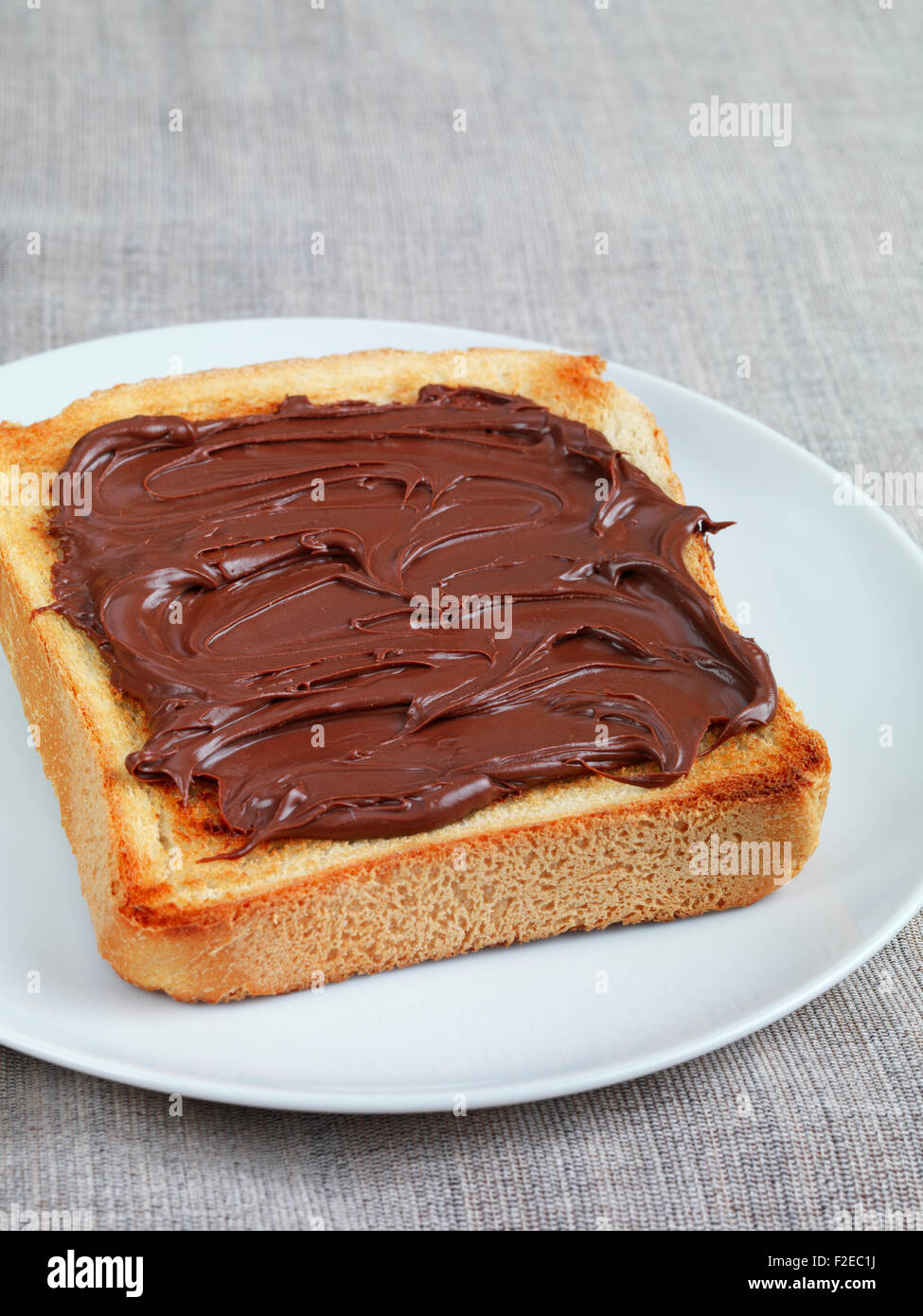 Toast with chocolate spread Stock Photo Alamy