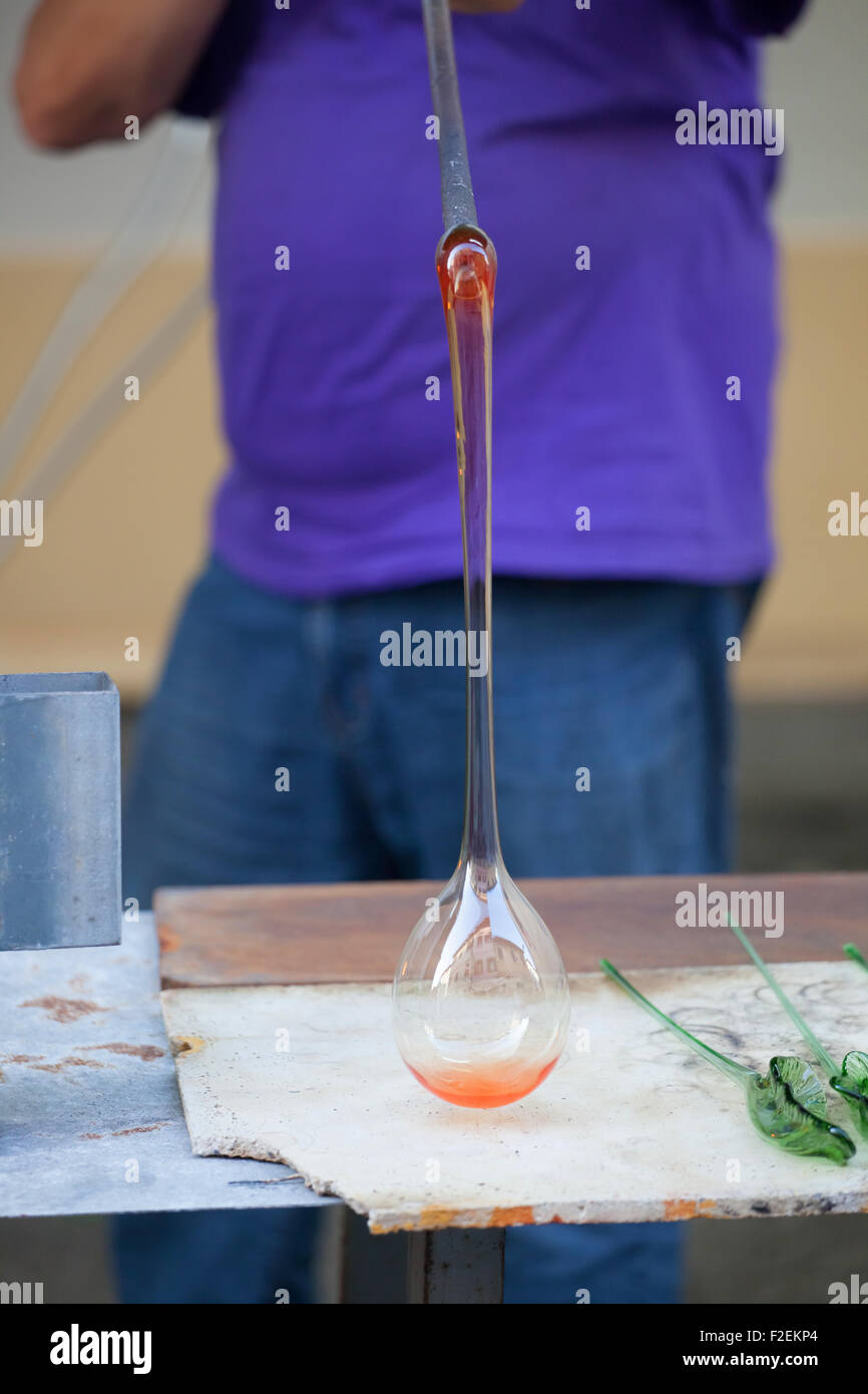 Handcrafted of glass blowing. Ancient craft for production of of glassware. Stock Photo