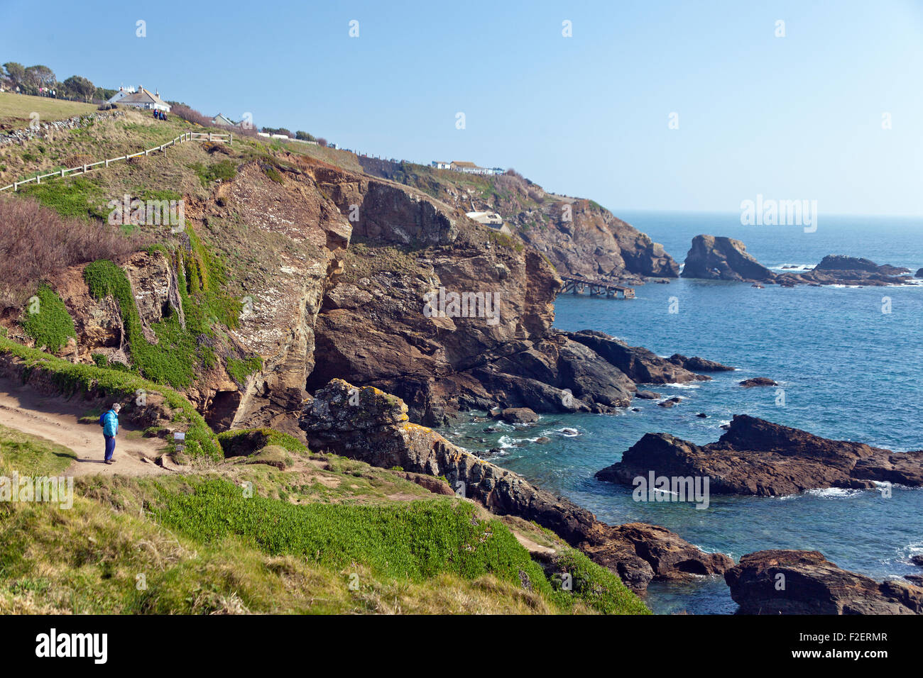 The dramatic coastal scenery on the SW Coast Path at Lizard Point Cornwall England - southernmost point on UK mainland Stock Photo