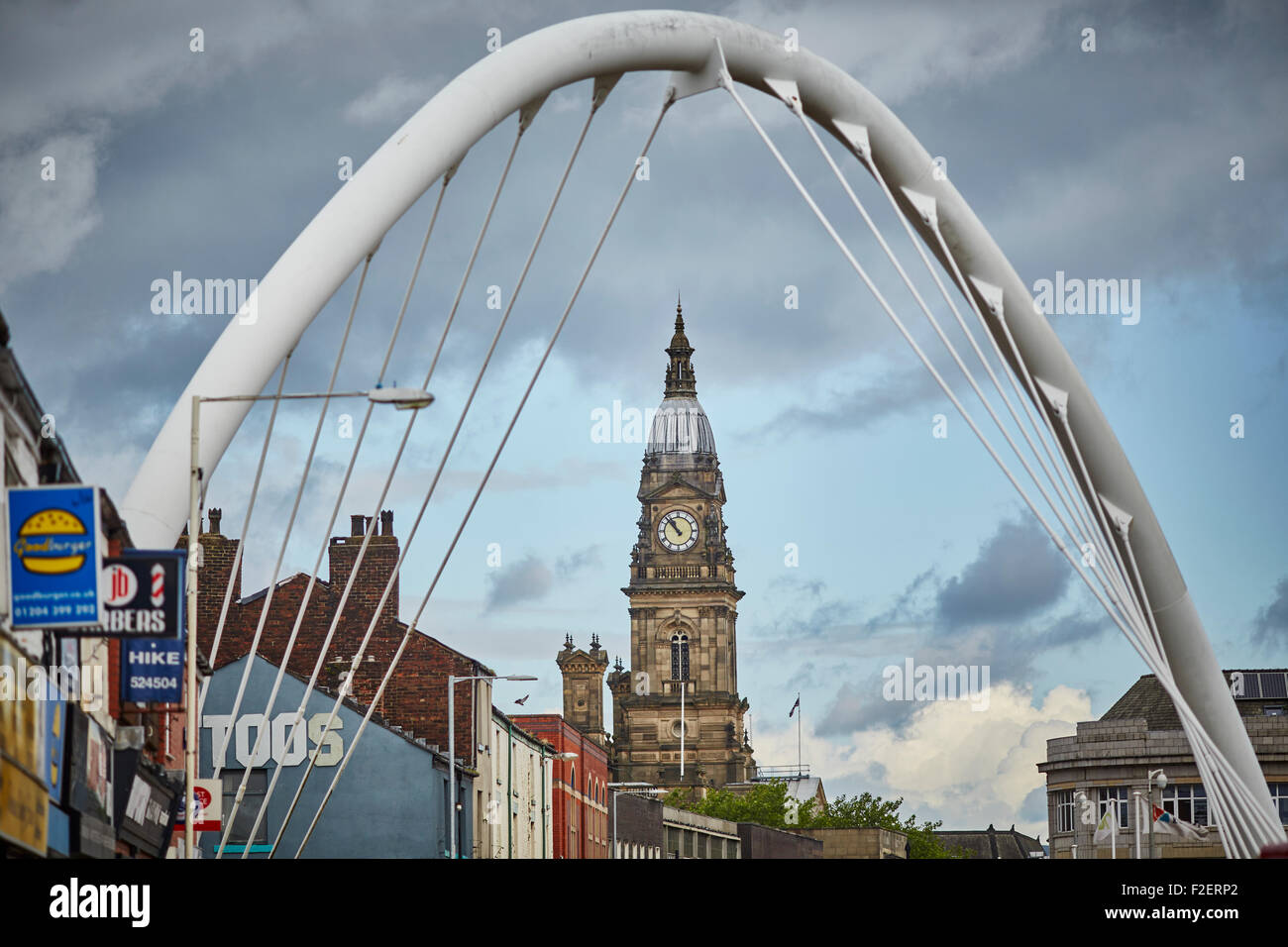 Bolton town hall  in the County of Lancashire framed by Gateway Bridge Arch  copyspace grade 2 two listed building clock tower Stock Photo