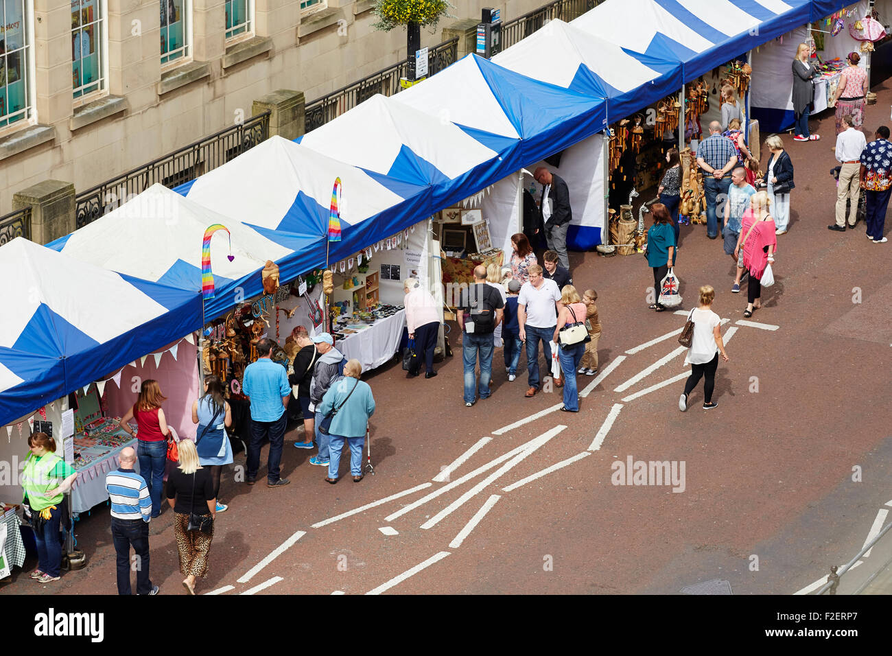 ALDI sponsored 10th Bolton Food and Drink Festival 2015    Market stall from above browsing street   Shops shopping shopper stor Stock Photo