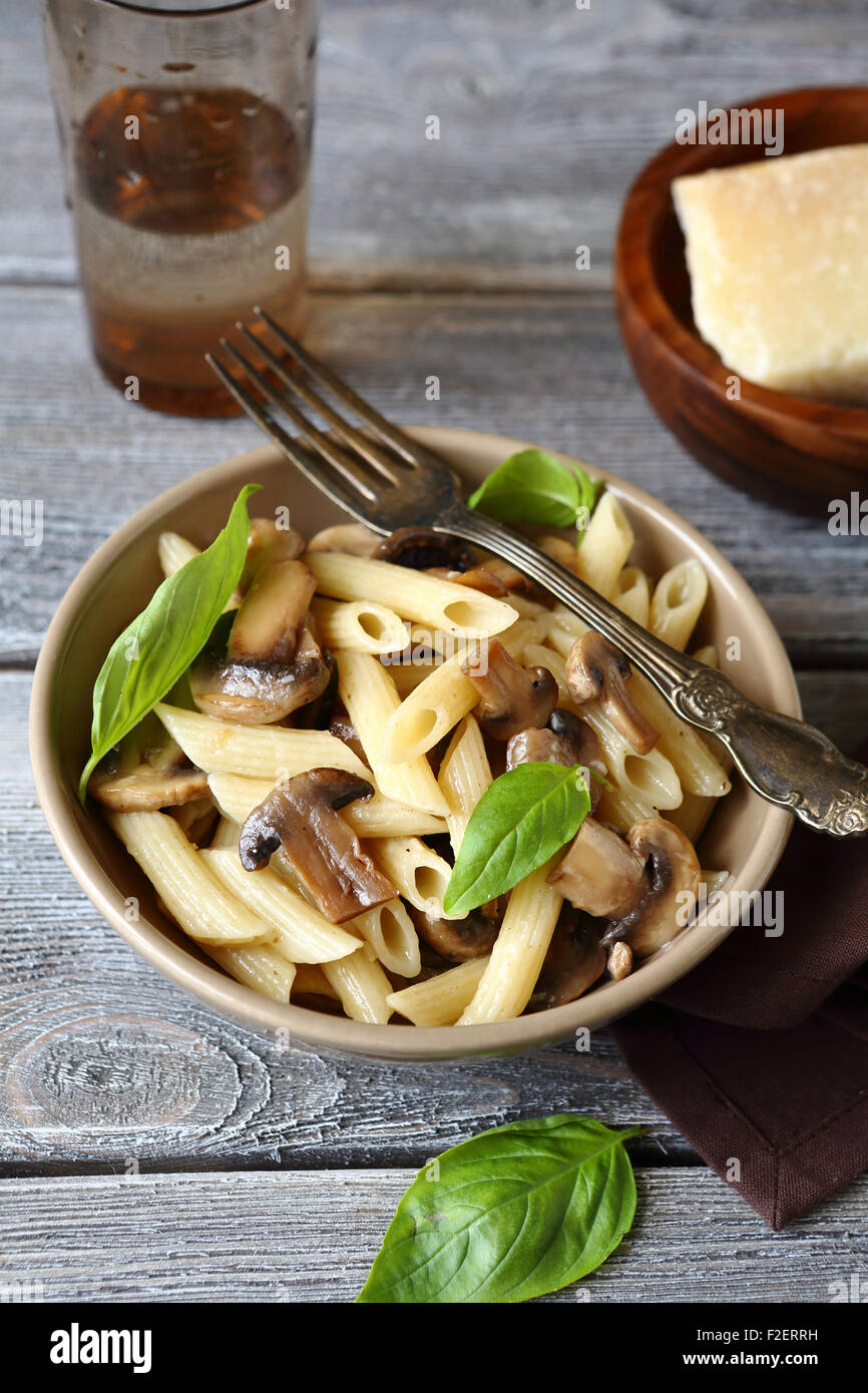 Pasta with mushrooms in bowl, food Stock Photo