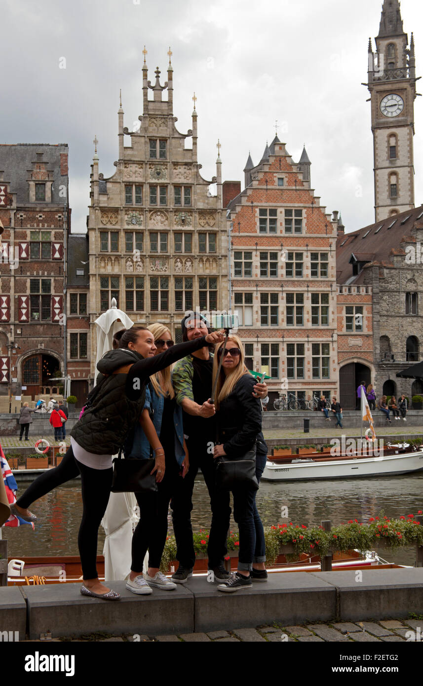 Young people teenagers taking selfie by canal Ghent Europe Stock Photo