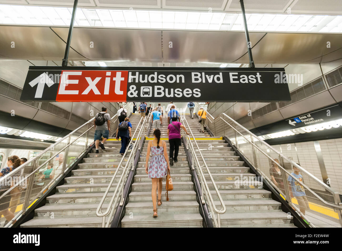 Hundreds of visitors in the new 34th Street-Hudson Yards terminal station on the 7 Subway line extension in New York on its grand opening, Sunday, September 13, 2015.  The new tunnel from Times Square  terminates 108 feet below street level at West 34th Street and Eleventh Avenue at the doorstep of the rezoned 45 block Hudson Yards development. It is the first subway station to open in 26 years and the first line extension in 60 years. (© Richard B. Levine) Stock Photo