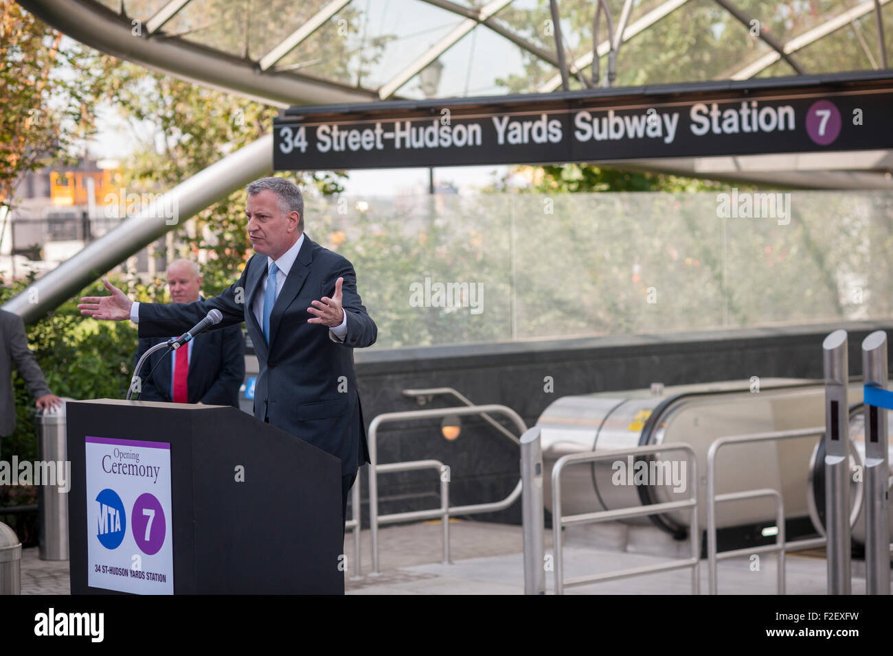 New York Mayor Bill de Blasio speaks at the new 34th Street-Hudson Yards terminal station on the 7 Subway line extension on its grand opening, Sunday, September 13, 2015.  The new tunnel from Times Square  terminates 108 feet below street level at West 34th Street and Eleventh Avenue at the doorstep of the rezoned 45 block Hudson Yards development. It is the first subway station to open in 26 years and the first line extension in 60 years. (© Richard B. Levine) Stock Photo