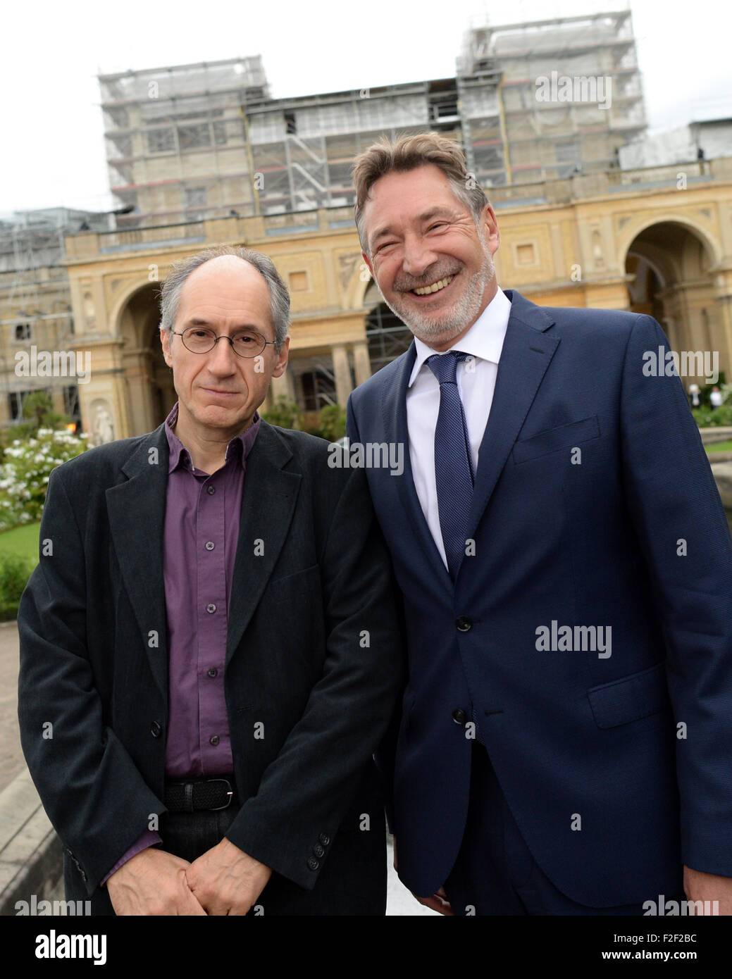 Potsdam, Germany. 17th Sep, 2015. Gerard Biard (L), editor-in-chief of French satirical magazine Charlie Hebdo, poses with Jann Jacobs, senior mayor of Potsdam, prior to a press conference on occasion of the media conference M100 Sanssouci Colloquium in Potsdam, Germany, 17 September 2015. The French satirical magazine will receive this year's M100 Media Award. Photo: RALF HIRSCHBERGER/dpa/Alamy Live News Stock Photo