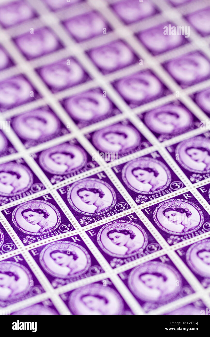 Sheet of 1950's British Royal Mail 3d violet postage stamps from the