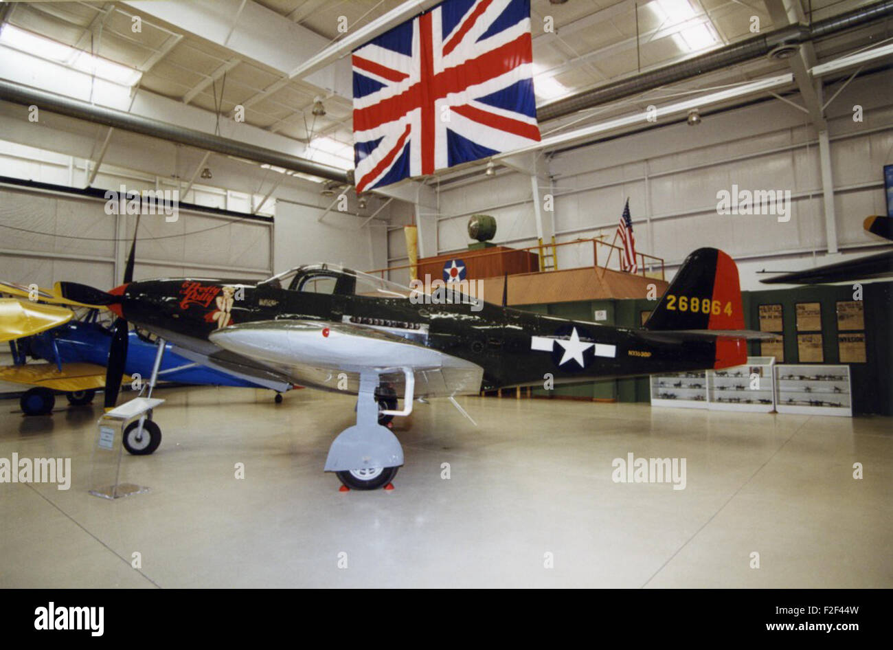 The Bell P-63A-1BE Kingcobra, serial number 42-68864 (NX163BP), was a World War II-era fighter aircraft. Known for its distinctive nose design, 'Pretty Polly' was used primarily in training roles and reconnaissance missions during the war. Stock Photo