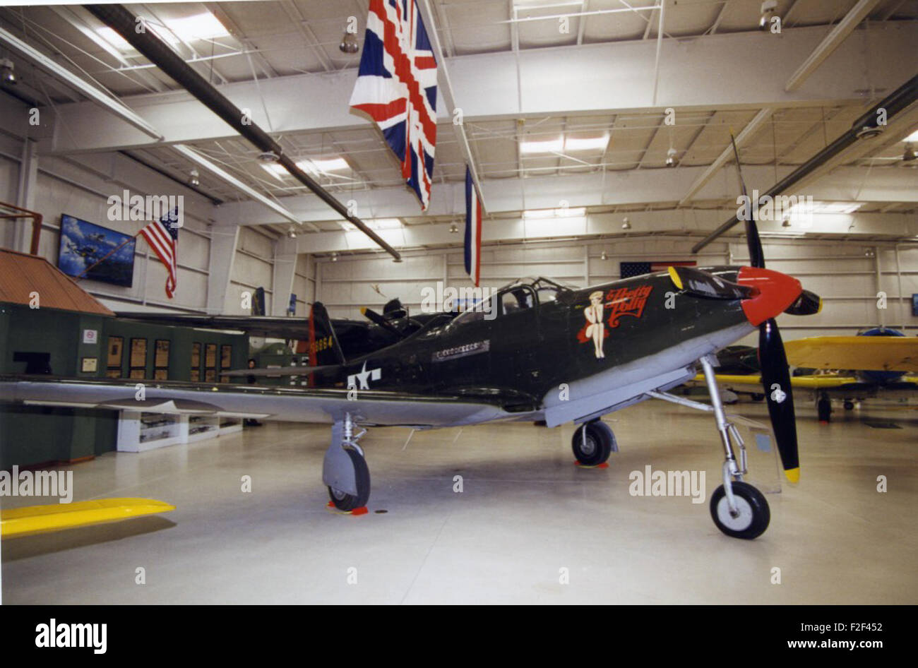 The Bell P-63A-1BE Kingcobra, with serial number 42-68864 and registration NX163BP, is a World War II-era fighter aircraft. Known as 'Pretty Polly,' this aircraft was used primarily by the U.S. military and is now preserved as a historical artifact. Stock Photo