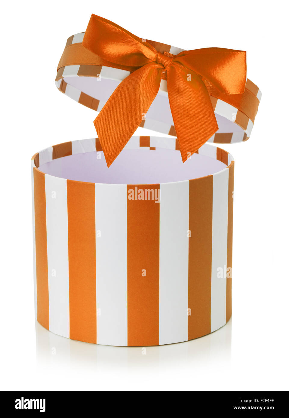 orange gift box with white stripes isolated on the white background. Stock Photo