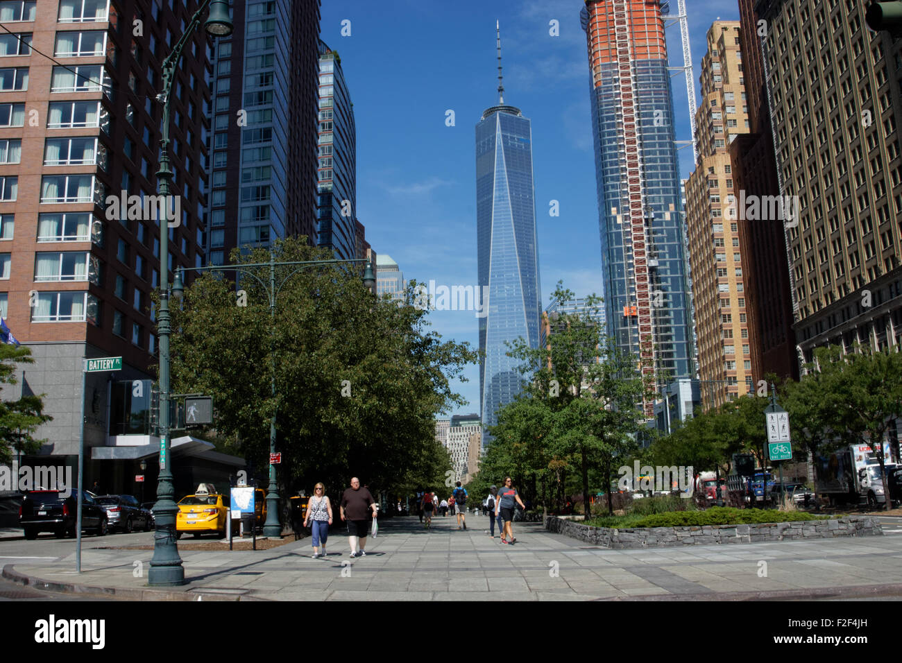 Looking north from Battery Place toward 1 World Trade Center and 50 West St., an apartment building that is under construction. Stock Photo
