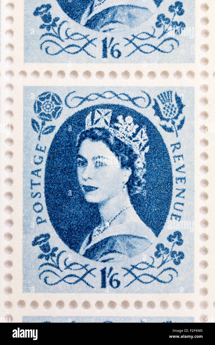 Sheet of 1950's British Royal Mail1s 6d blue postage stamps from the Wildings definitive issue with portrait of Queen Elizabeth II. Stock Photo