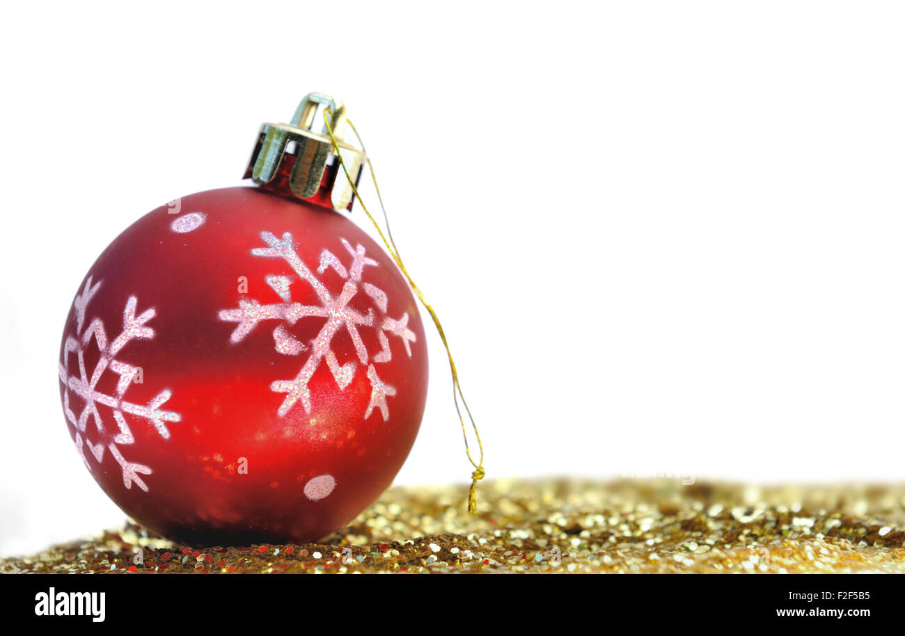 Red christmas balls and gold glitter on white background Stock Photo ...