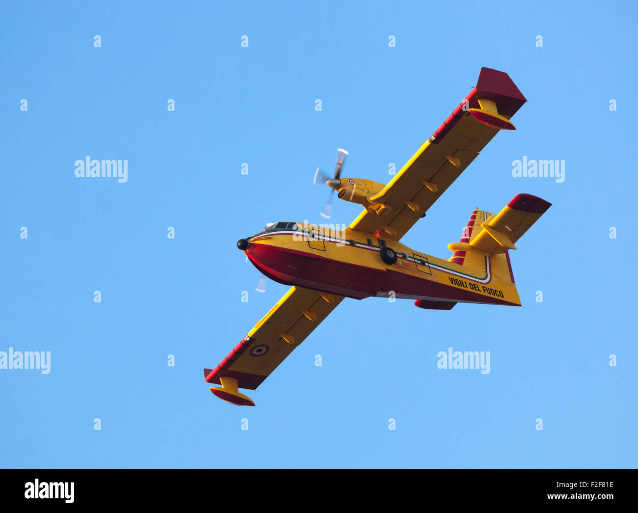 Aerial firefighting. Aircraft preparing to collect sea water. Stock Photo