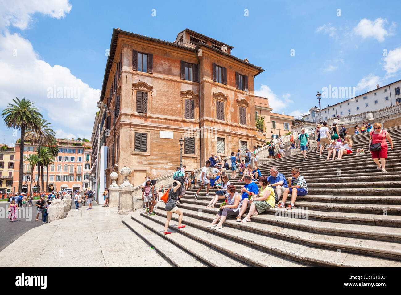 Tourists sitting down on and walking up The Spanish Steps Piazza di spagna Roma Rome lazio Italy EU Europe Stock Photo