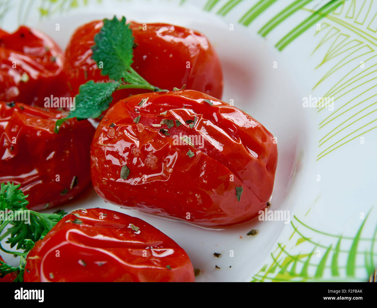 Tomato compote side dish roasted or cooked tomatoes.American cuisine