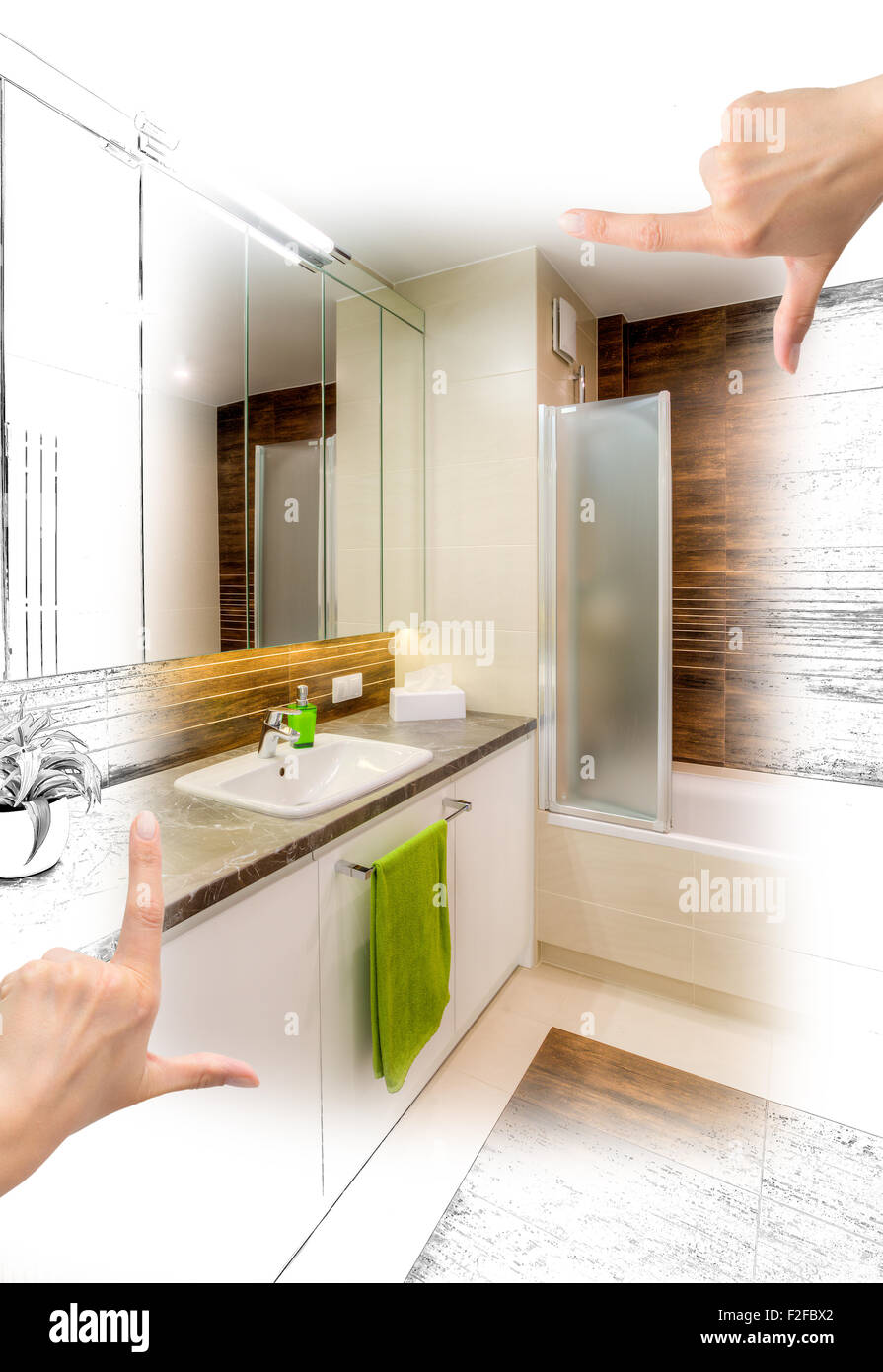 Female hands framing custom bathroom design. Combination drawing and photo. Stock Photo