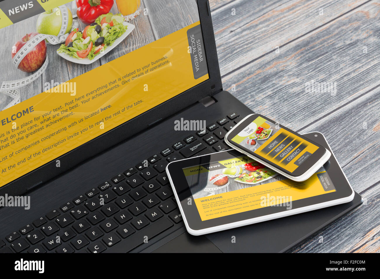 Responsive web design on mobile devices phone, laptop and tablet pc Stock Photo