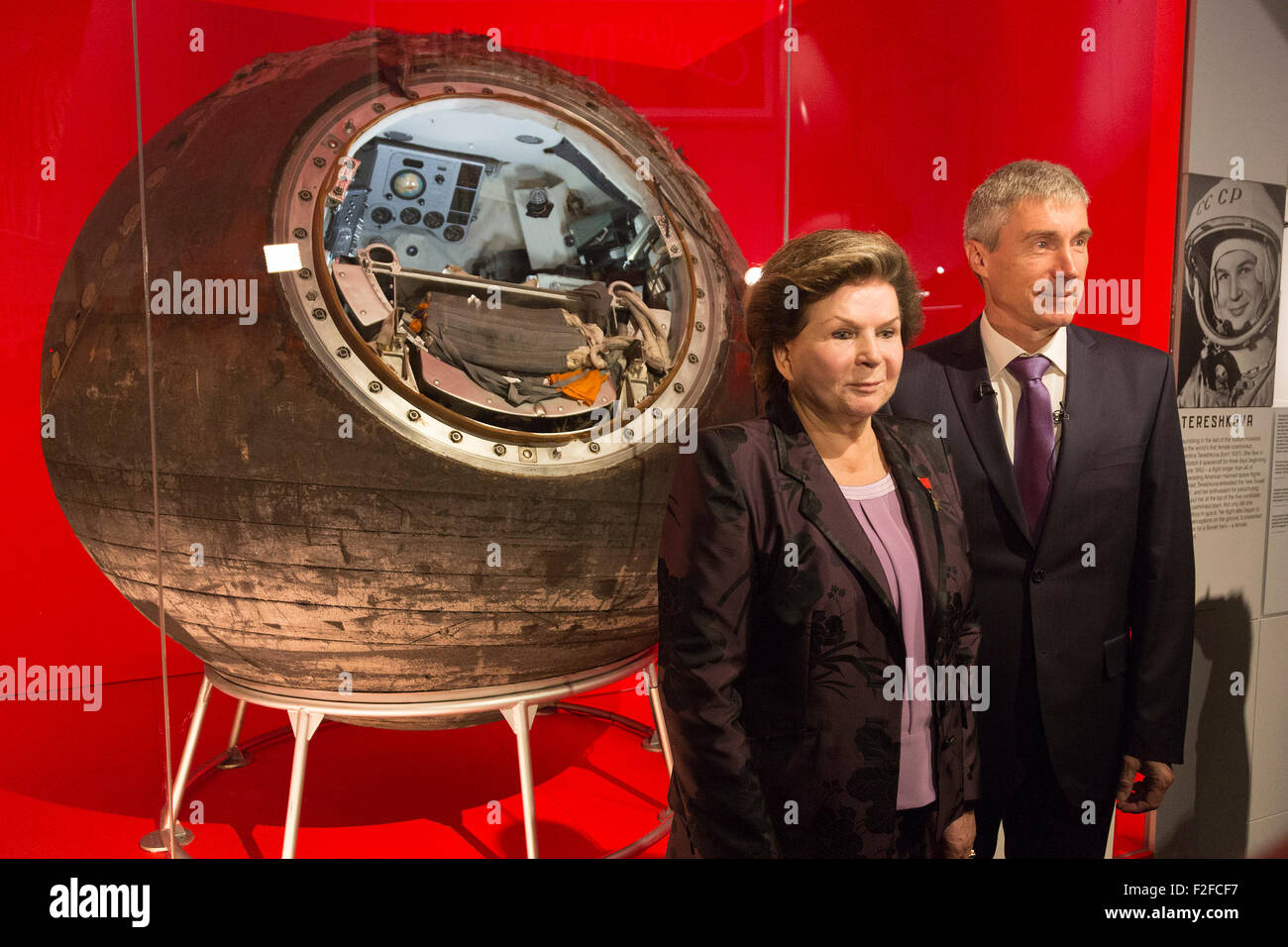 London, UK. 17/09/2015. Cosmonauts Valentina Tereshkova and Sergei Krikalev pose in front of the spacecraft Vostok-6 that took Tereshkova into space. The exhibition Cosmonauts - Birth of the Space Age opens at the Science Museum on 18 September 2015 and runs until 13 March 2016. Stock Photo