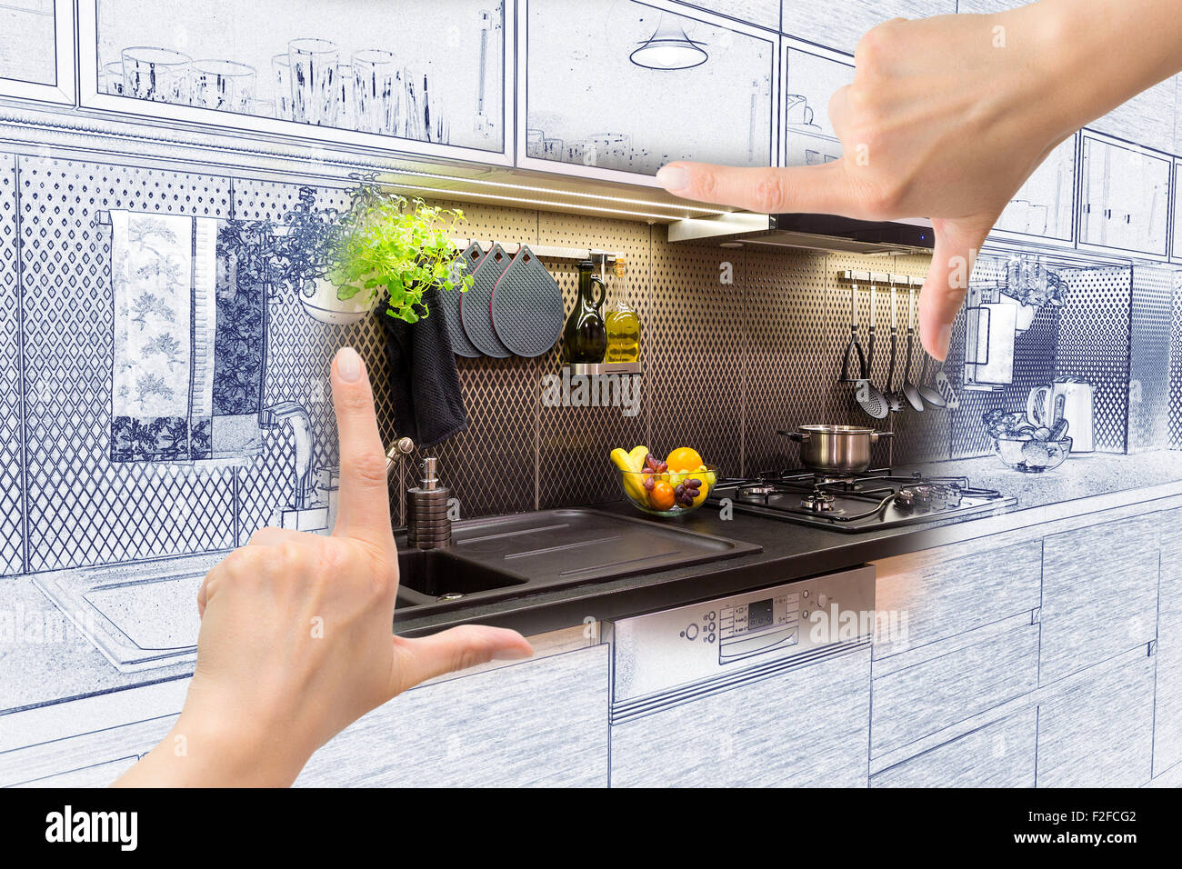 Female hands framing custom kitchen design. Combination drawing and photo. Stock Photo