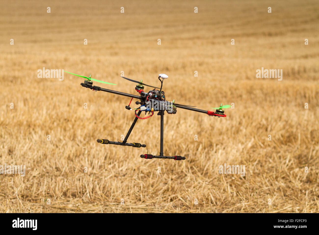 Quadcopter in flight Stock Photo - Alamy