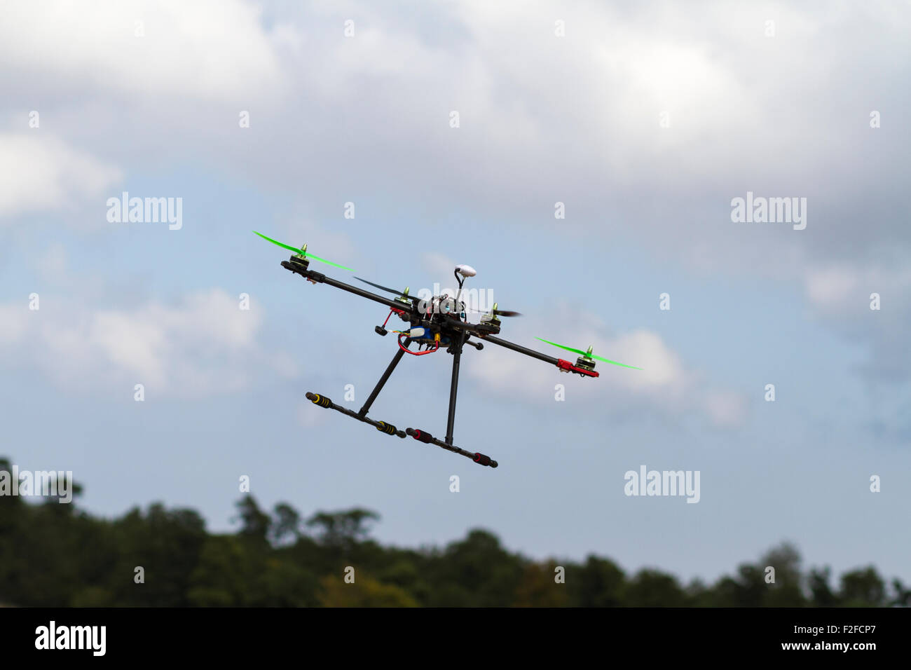 Quadcopter in flight Stock Photo