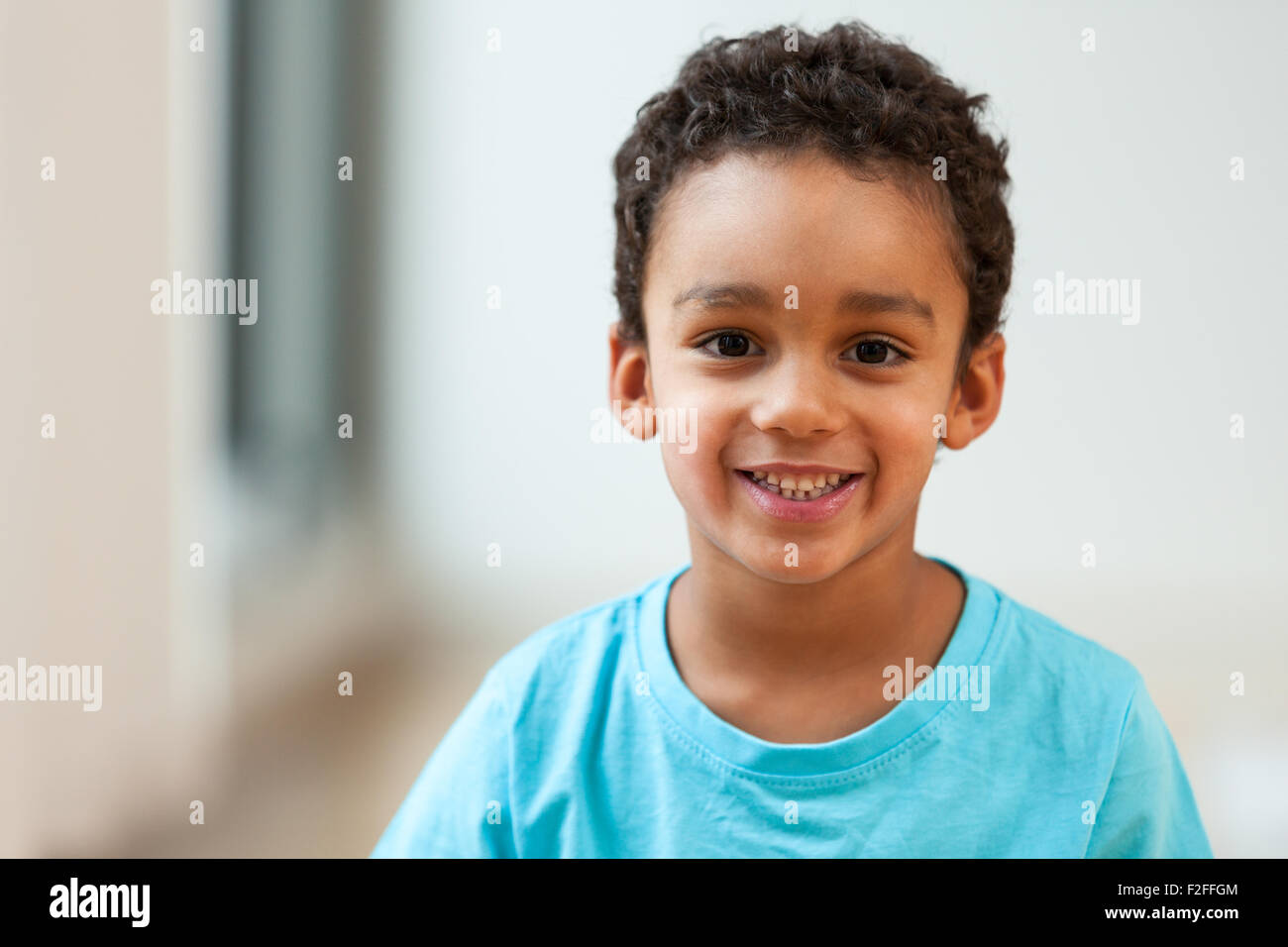 Portrait of a cute little African American boy smiling Stock Photo - Alamy
