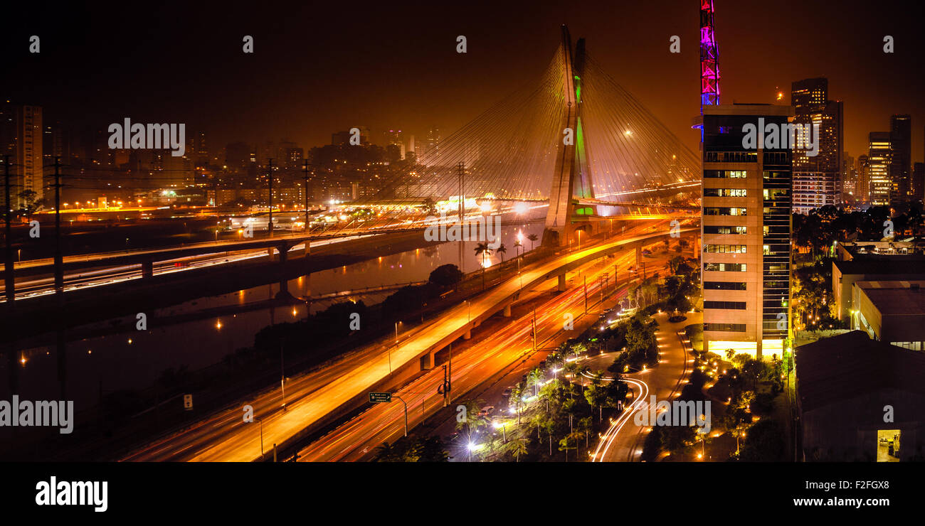 Most famous bridge in the city at night, Octavio Frias De Oliveira Bridge, Pinheiros River, Sao Paulo, Brazil Stock Photo