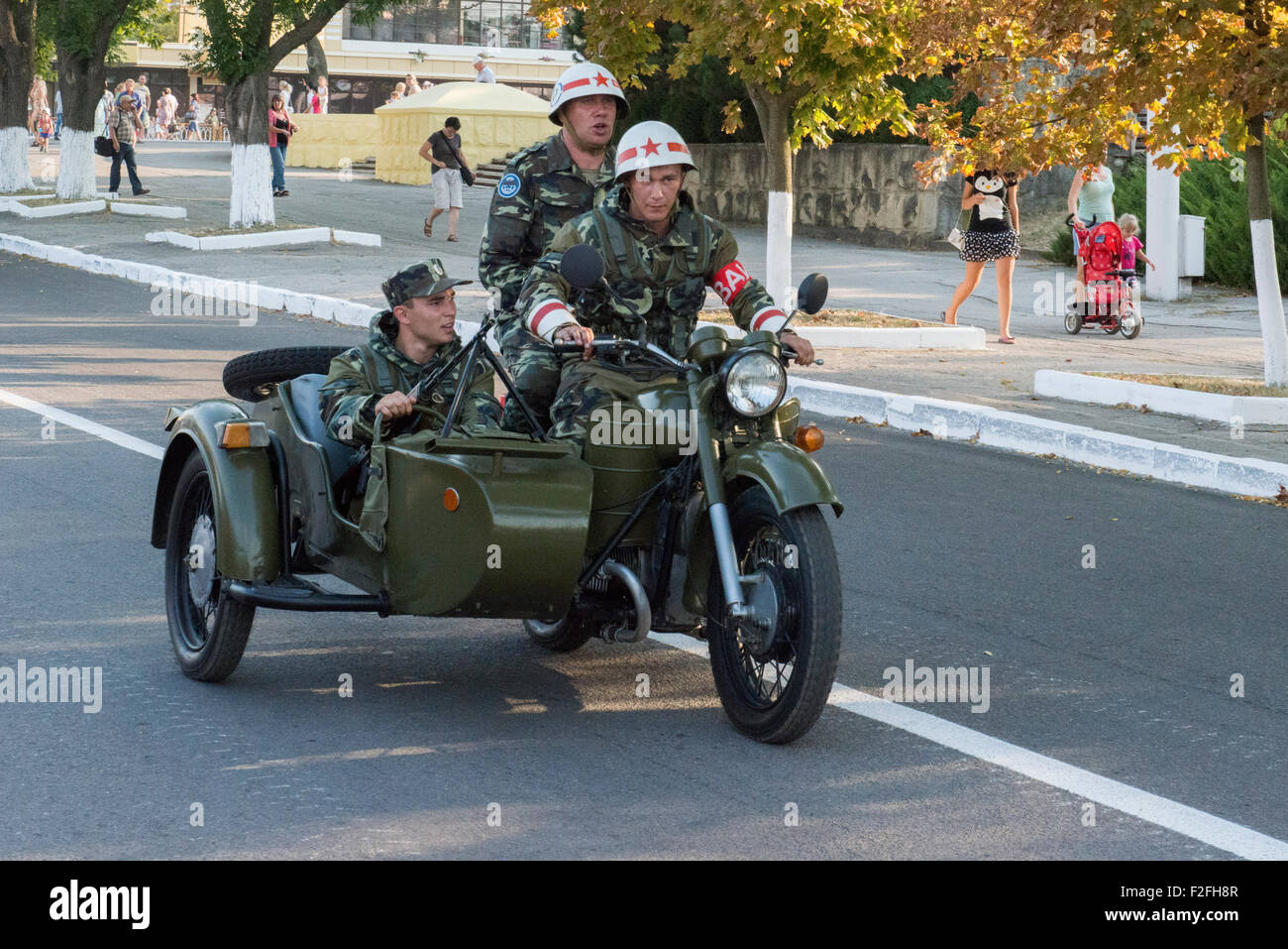 Soldiers Riding Side-car - 25th Anniversary of the Pridnestrovian Moldavian Republic PMR, Transnistria, Soviet USSR Moldova Stock Photo