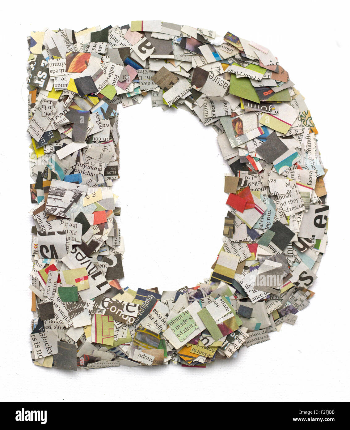 The letter D made from newspaper confetti Stock Photo Alamy