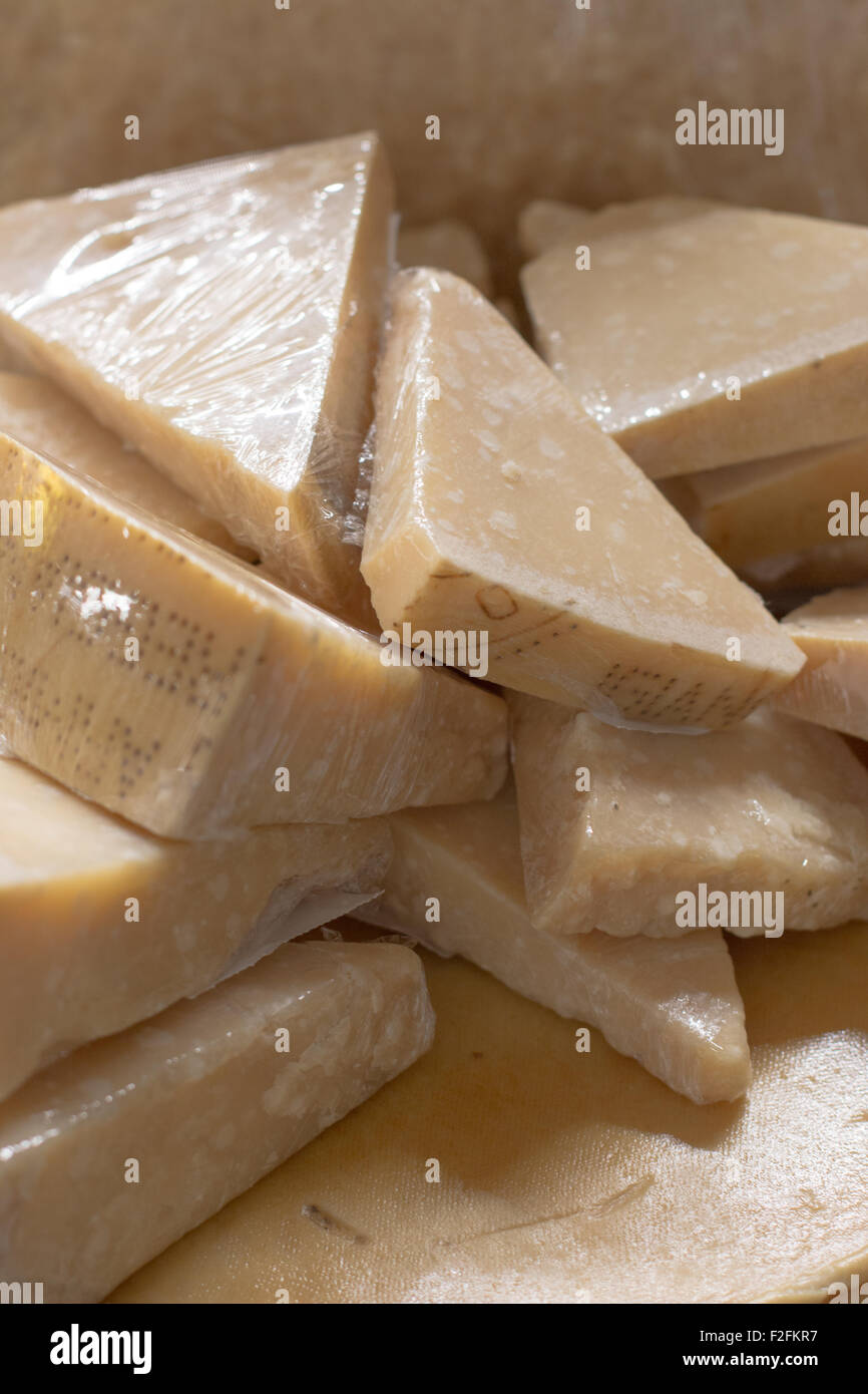 Parmesan cheese on display in a market Stock Photo Alamy