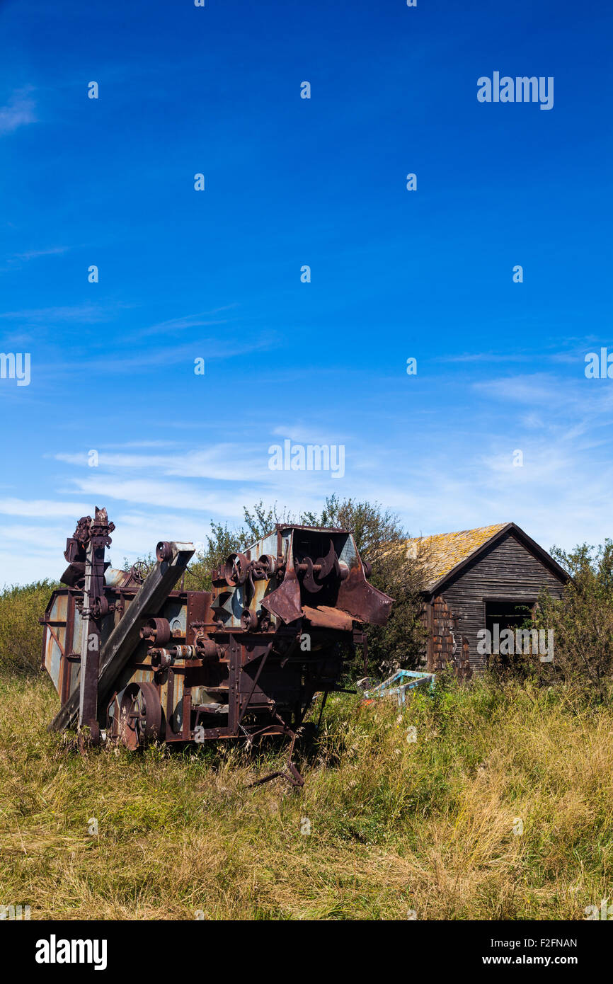 Old farming machinery abandoned in the ghost town of Bulwark, Alberta, Canada Stock Photo