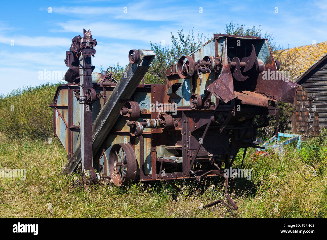 Old farming machinery abandoned in the ghost town of Bulwark, Alberta, Canada Stock Photo