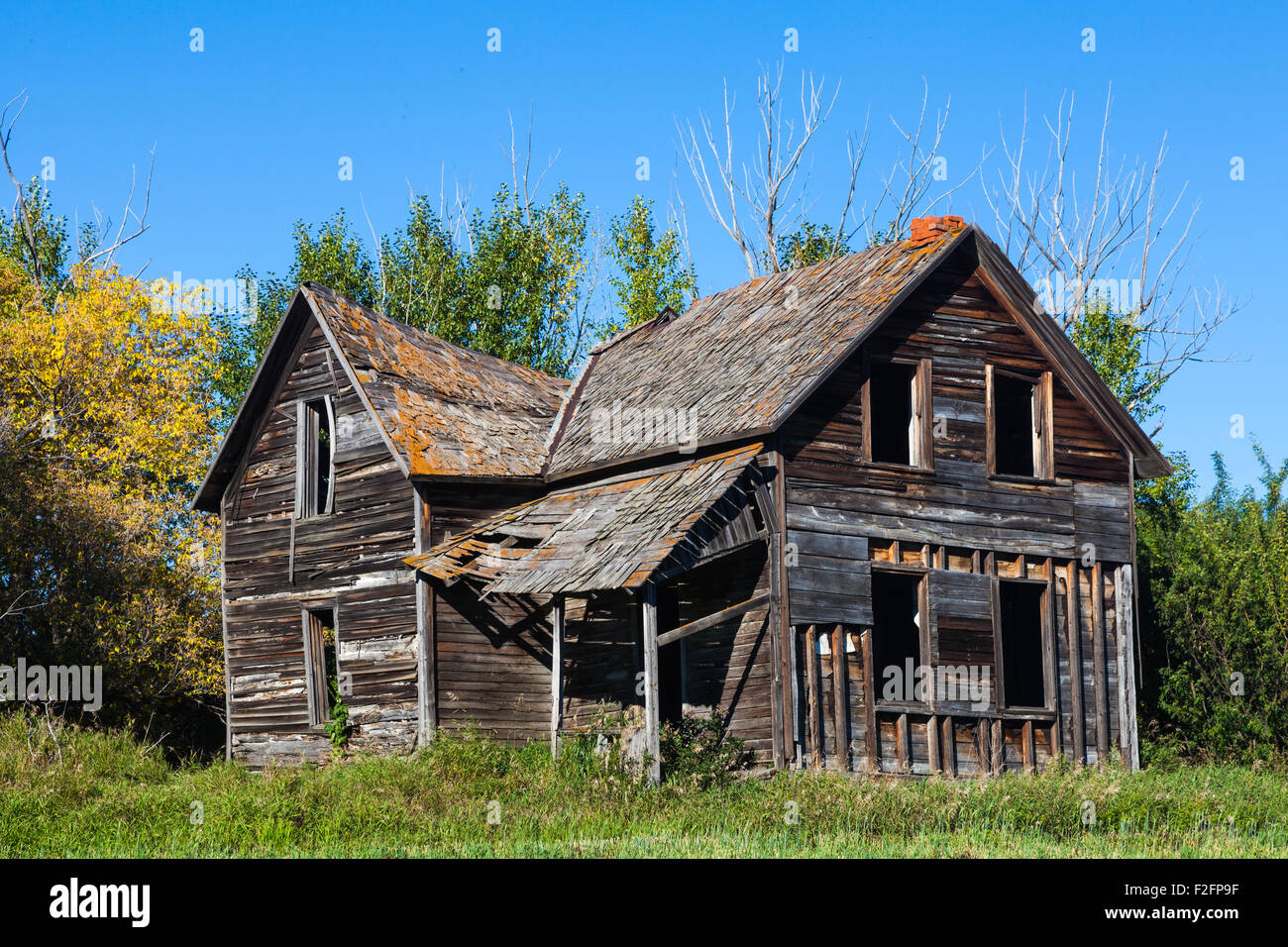 Abandoned farmhouse in a field near Leduc Alberta, Canada Stock Photo
