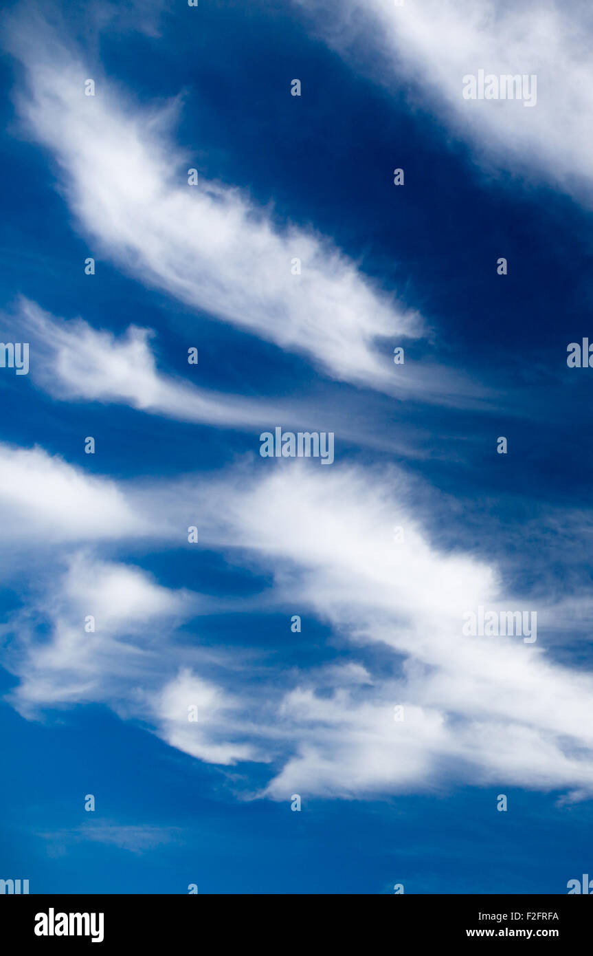 Scenic stratus clouds against deep blue sky Stock Photo Alamy