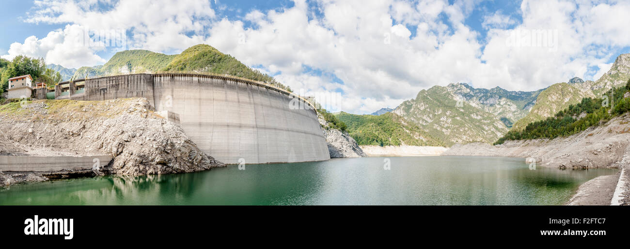 Landscape with dam for the production of electrical energy in the mountains Stock Photo