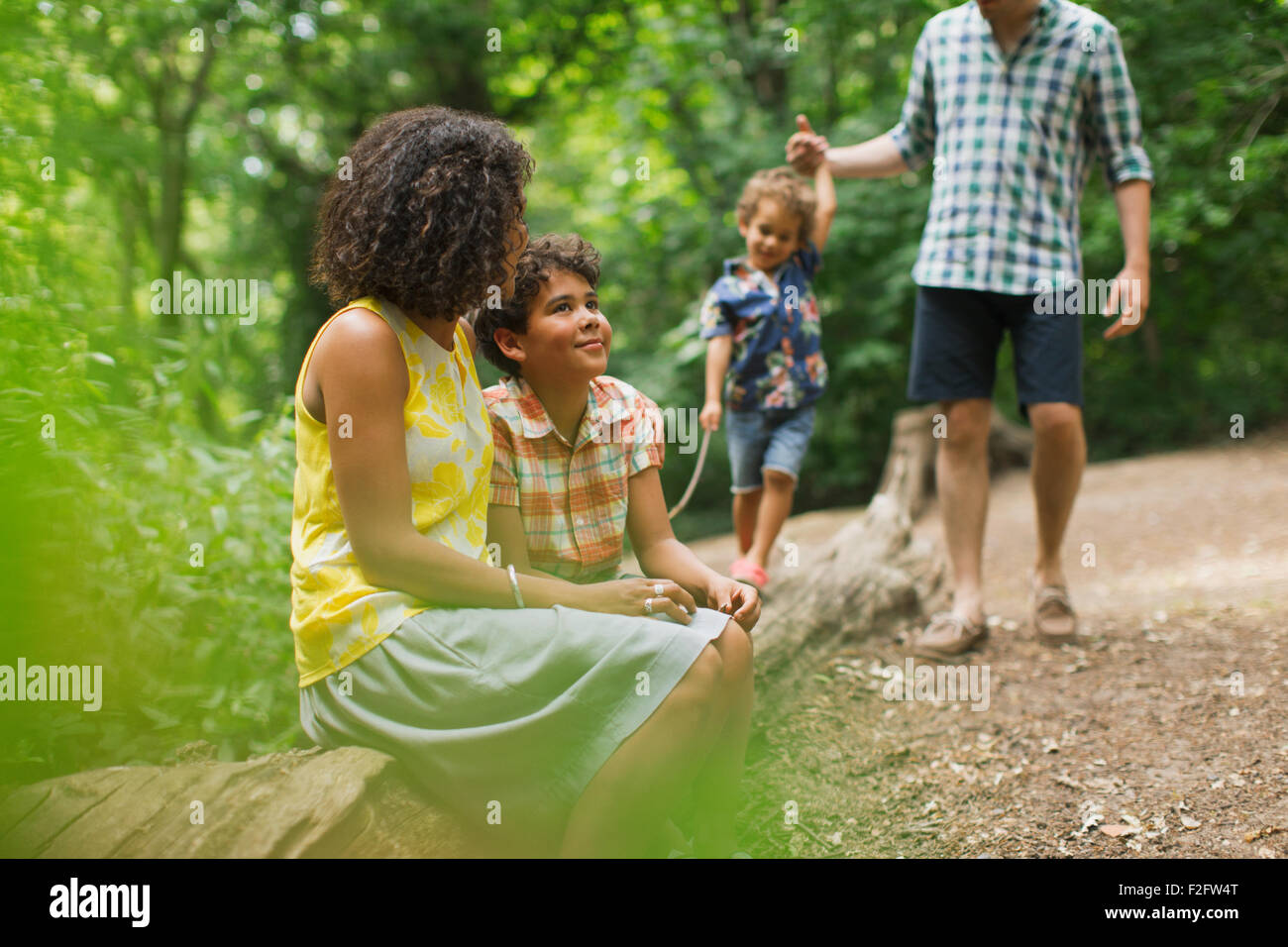 Family in woods Stock Photo