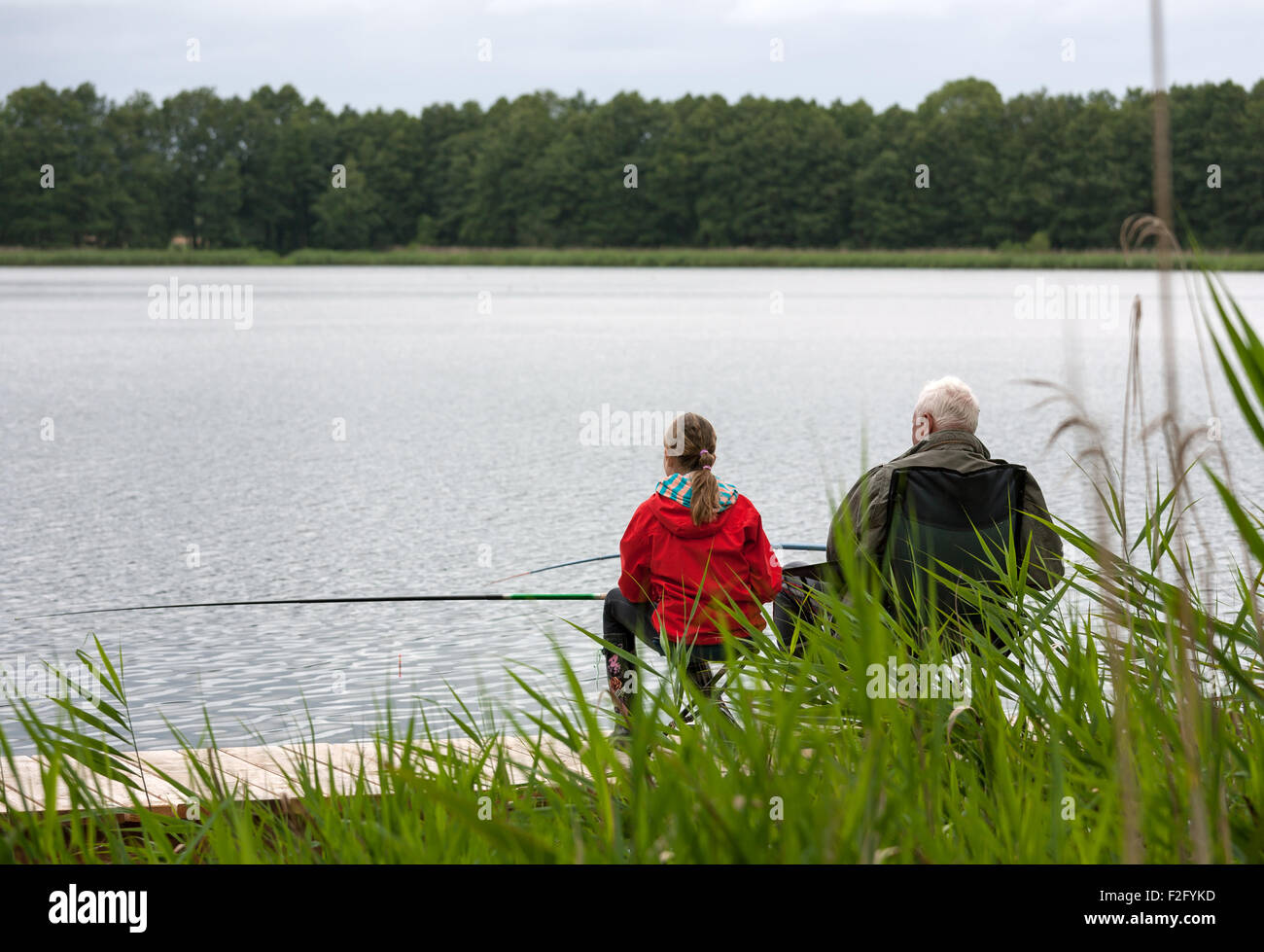 Grandfather and granddaughter fishing hi-res stock photography and images -  Alamy