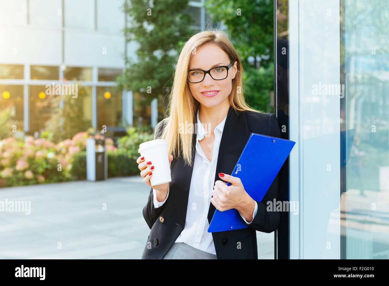 Businesswoman having a coffee break Stock Photo