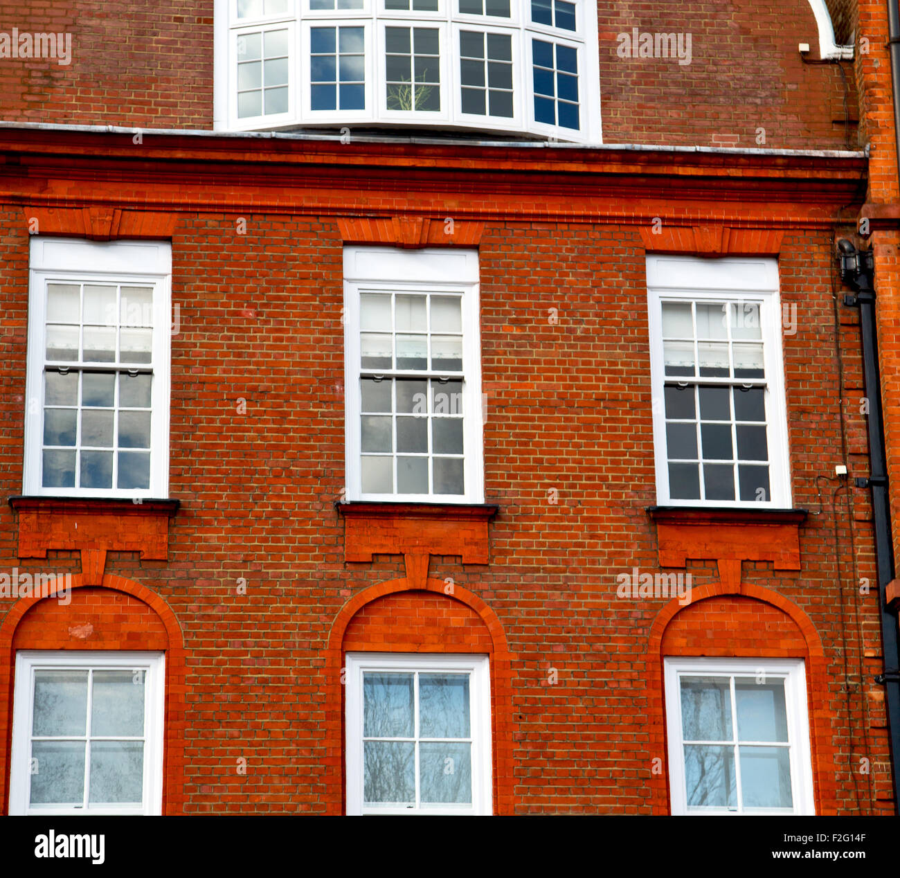 in europe london old red brick wall and historical window Stock Photo ...