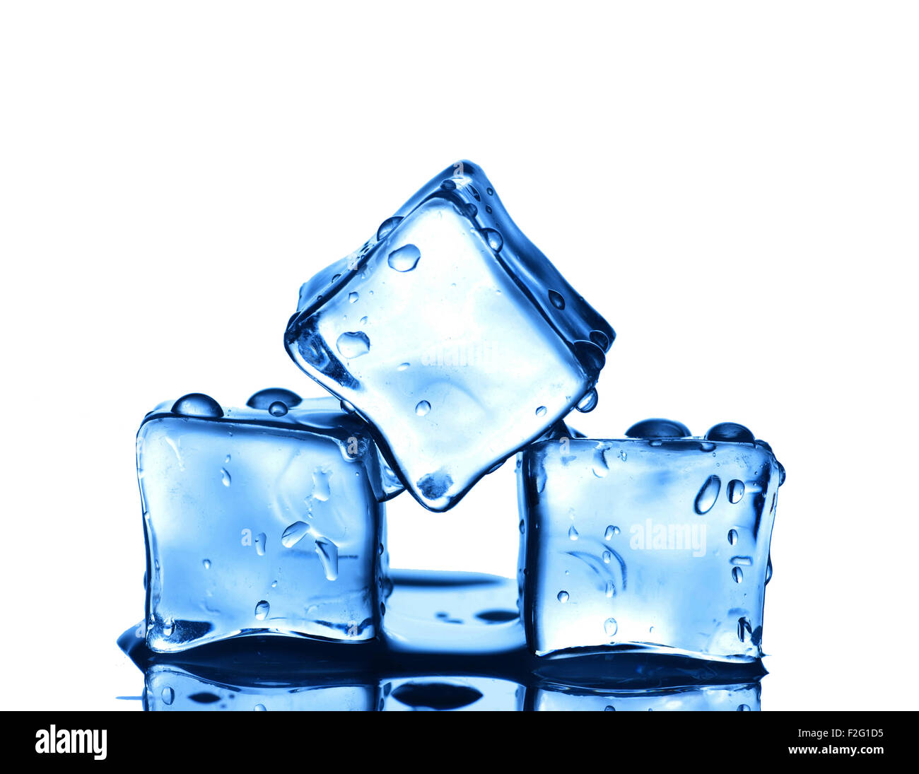 Three ice cubes on white background Stock Photo - Alamy