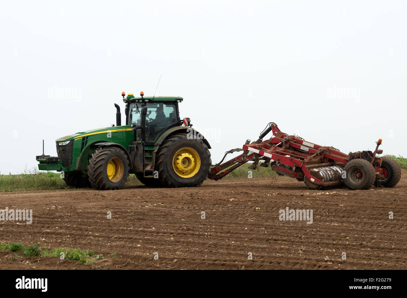 John Deere 8370R tractor with Sumo Trio sub-soiler Stock Photo