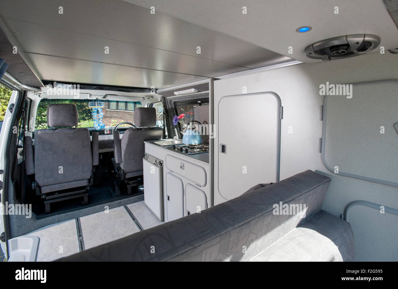 VW Volkswagen T4 camper van with pop top interior Stock Photo - Alamy