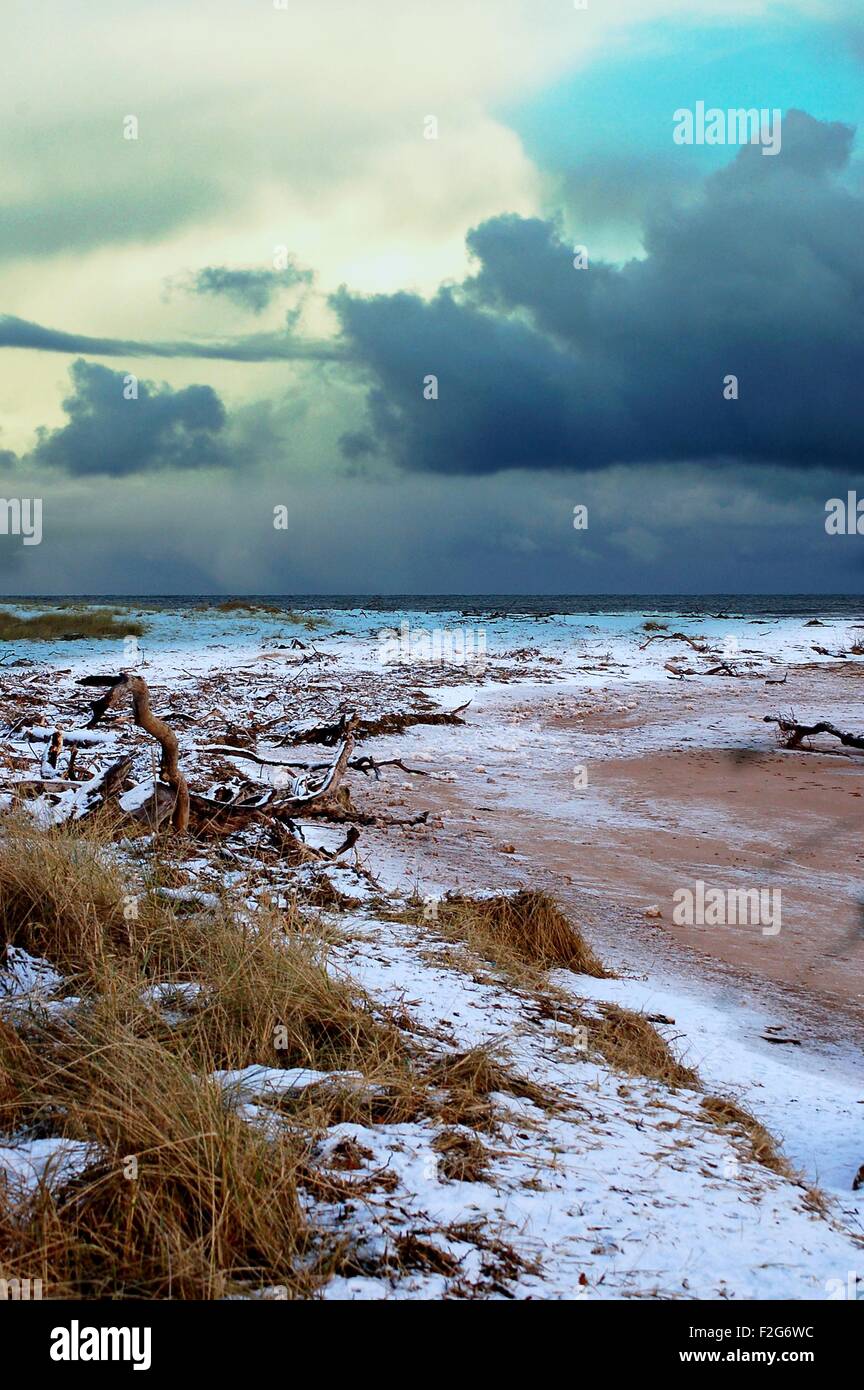 Light dusting of snow on Aberdeen Donmouth beach Stock Photo