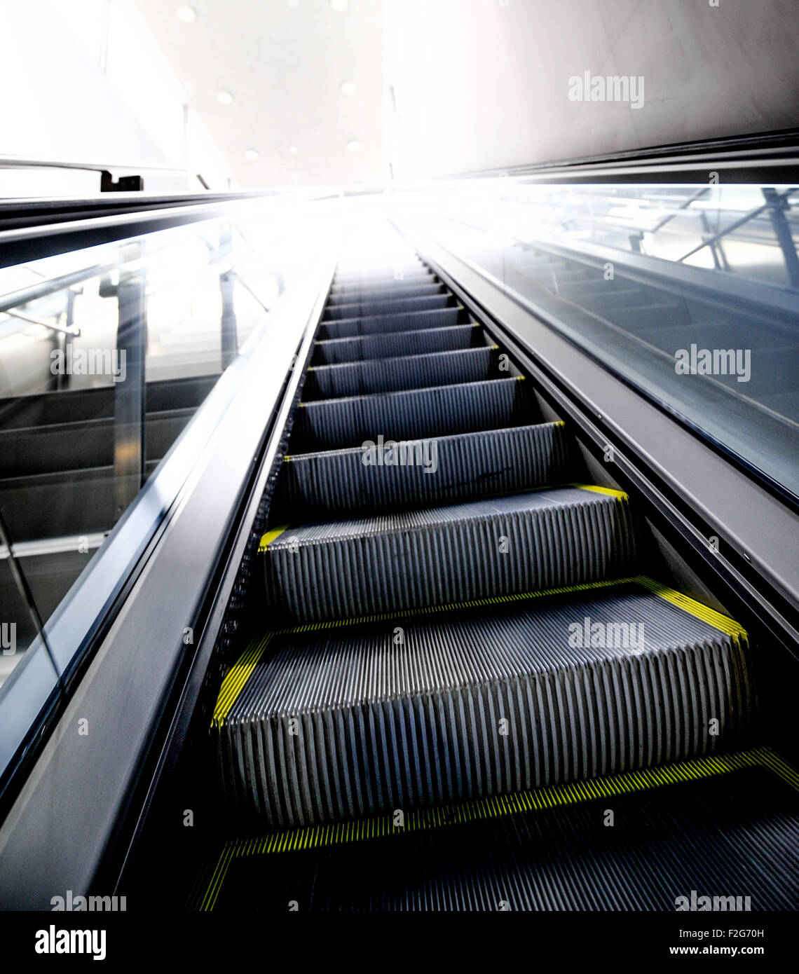 escalator in a metro station in Malaga- escalera mecánica en una estación de metro en Málaga Stock Photo