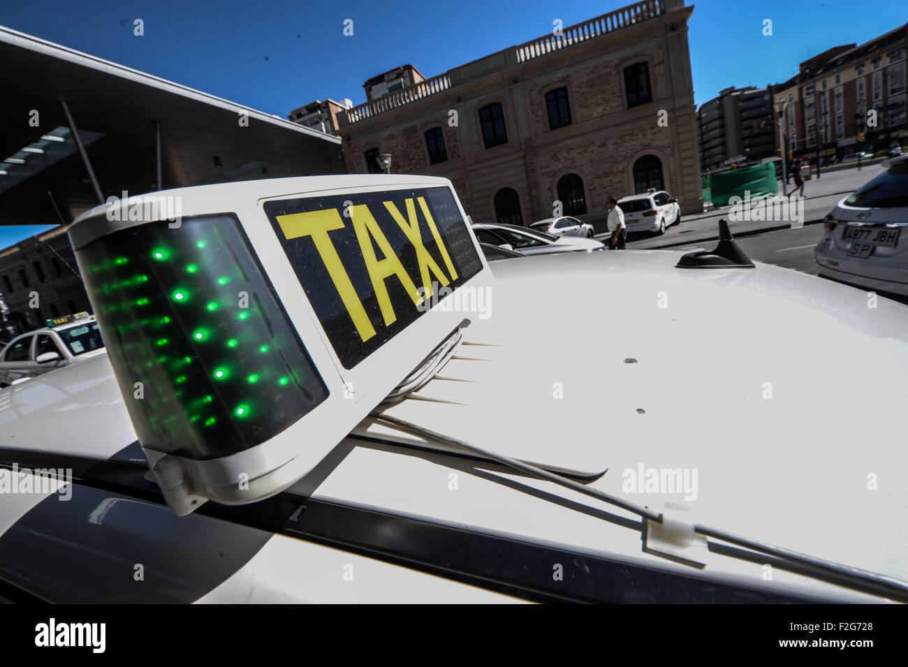 Taxi for hire sign at María Zambrano train station,Malaga,Spain Stock Photo