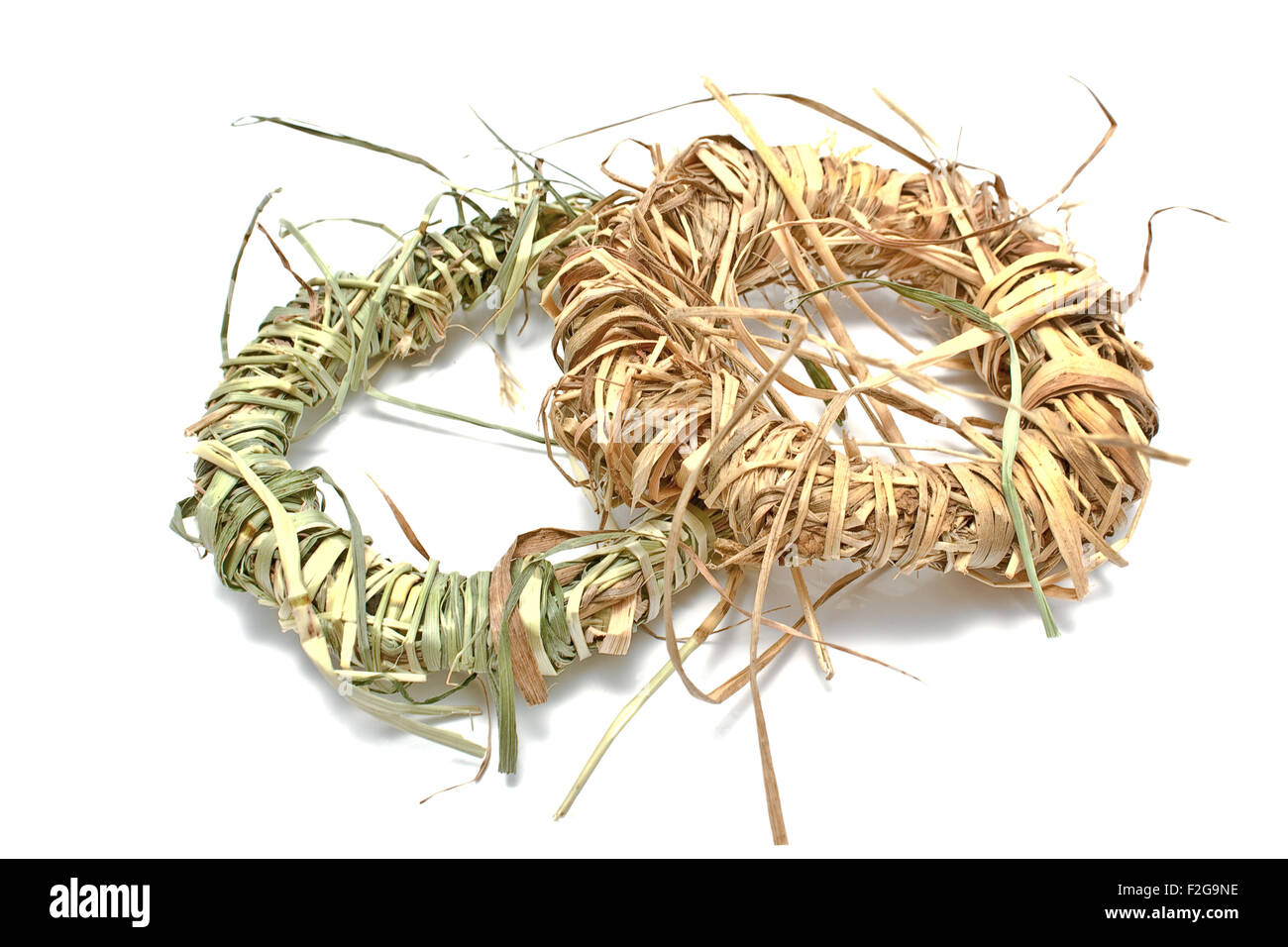 Wreaths made of straw isolated on white Stock Photo