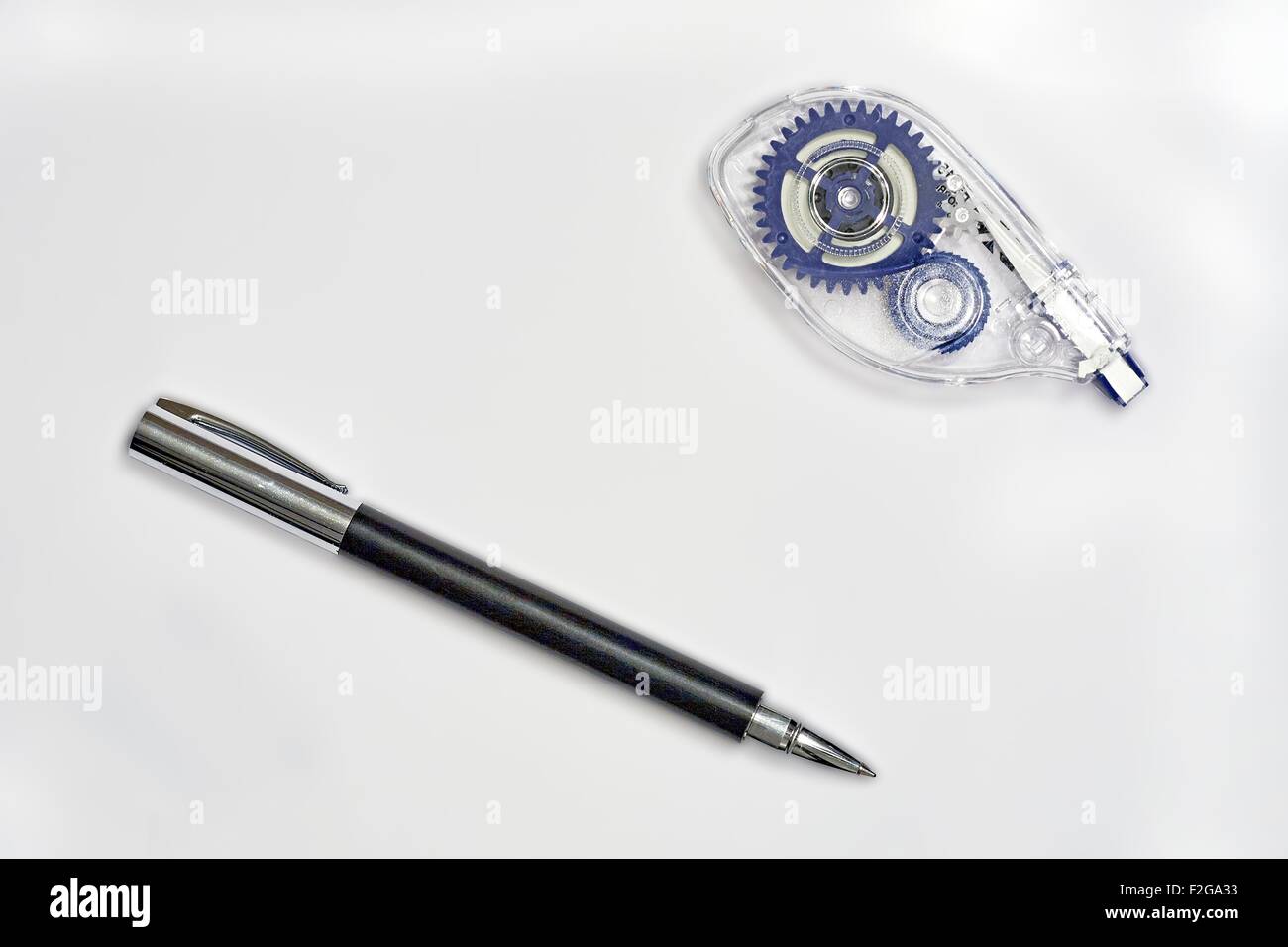 Faber-Castell Ambition Precious Resin Black Rollerball Pen and Correction Tape Stock Photo