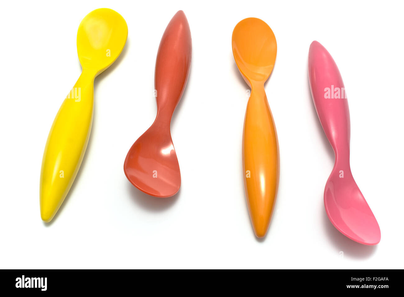Colorful spoons isolated on white Stock Photo